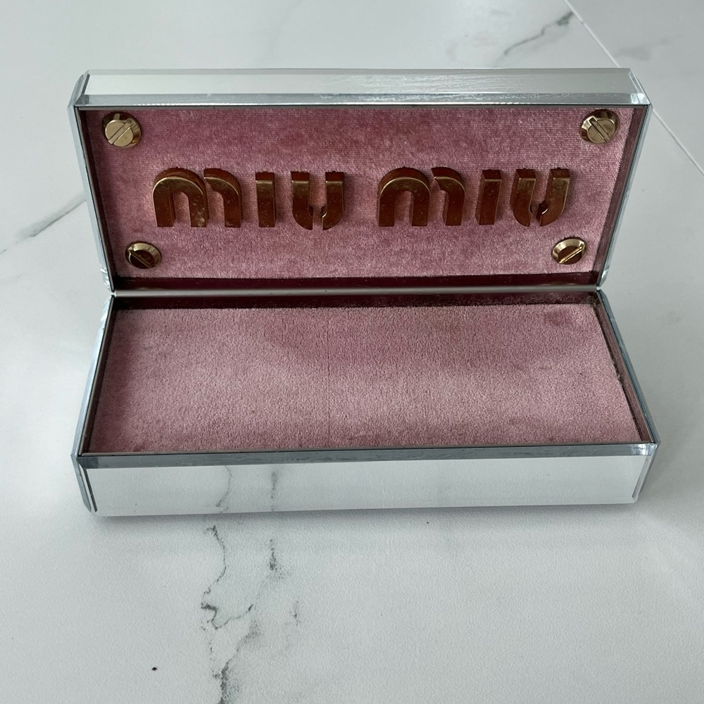 Miu Miu mirror eyewear display stand
